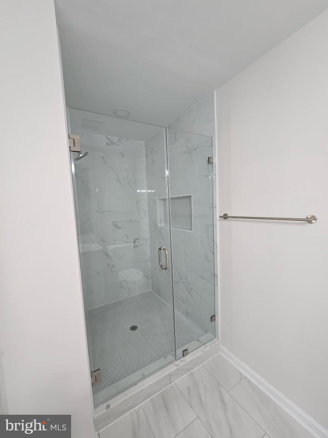 2452 South Walter Reed Drive, Unit 3 Arlington, VA 22206 - Photo 14 of 32 a bathroom with a shower