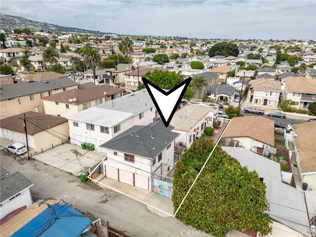 an aerial view of a swimming pool and mountain view