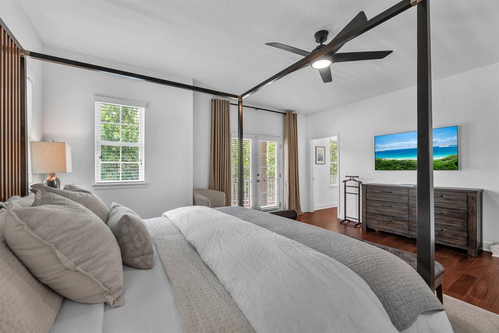 5310 Fishhawk Ridge Drive Lithia, FL 33547 - Photo 23 of 52 a bedroom with a large bed and a large window