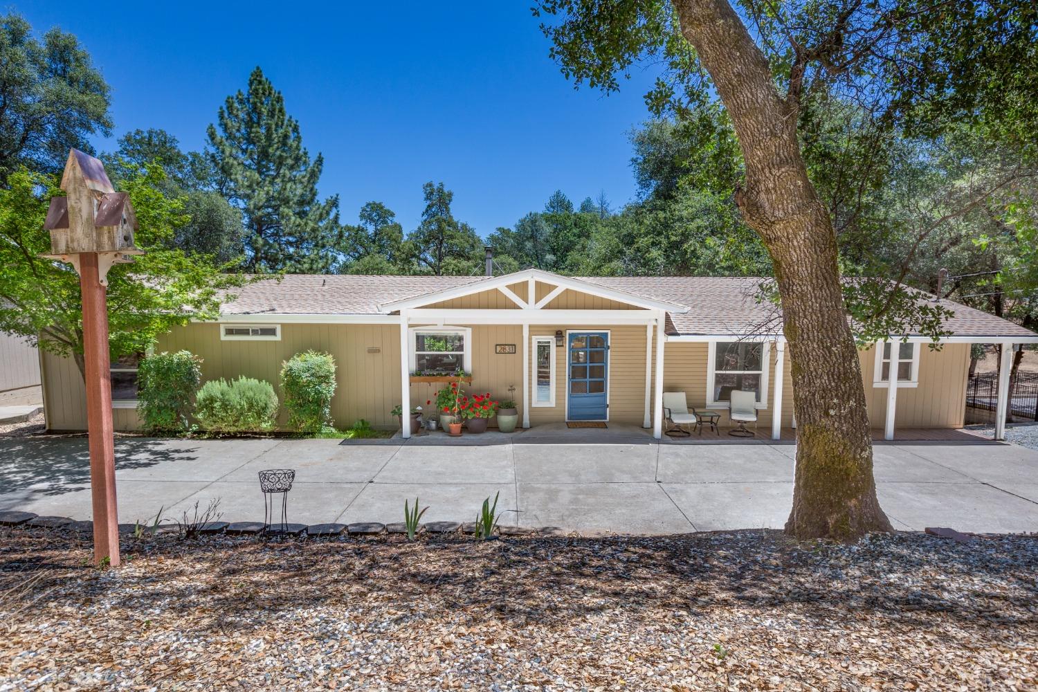 2831 Ponderosa Road Shingle Springs, CA 95682 - Photo 1 of 1 a front view of a house with a yard