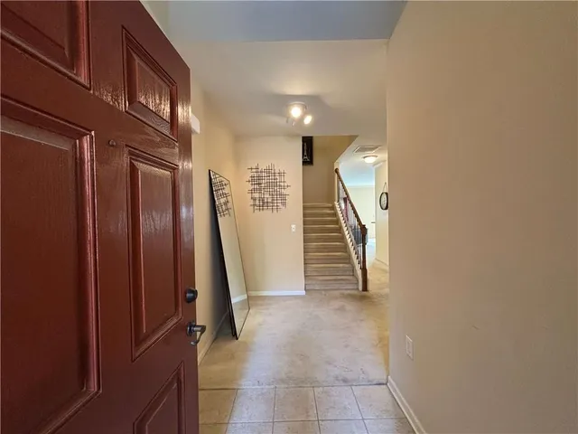 a view of entryway with stairs