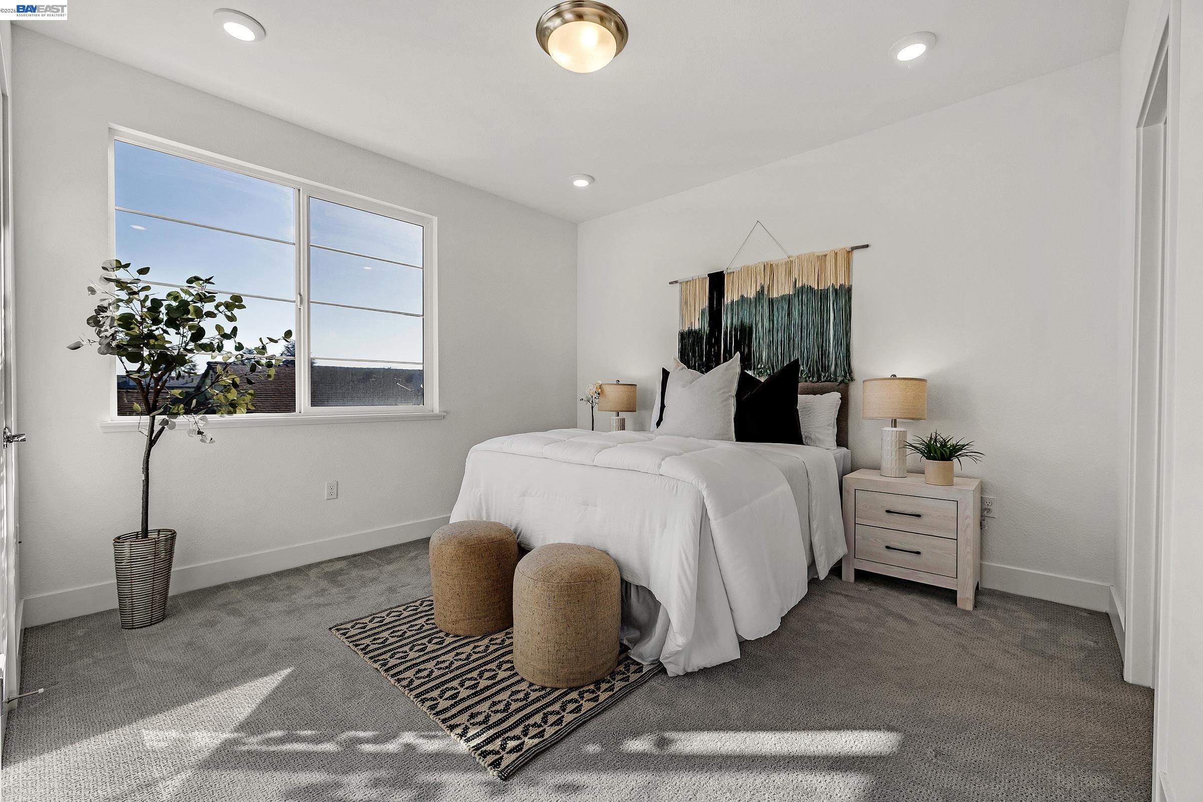29259 Hub Court Hayward, CA 94544 - Photo 14 of 34 a bedroom with a bed and a potted plant