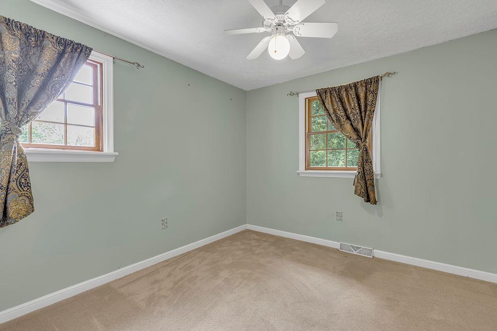 171 Dehaven Road Beaver Falls, PA 15010 - Photo 18 of 35 a view of room with window and ceiling fan
