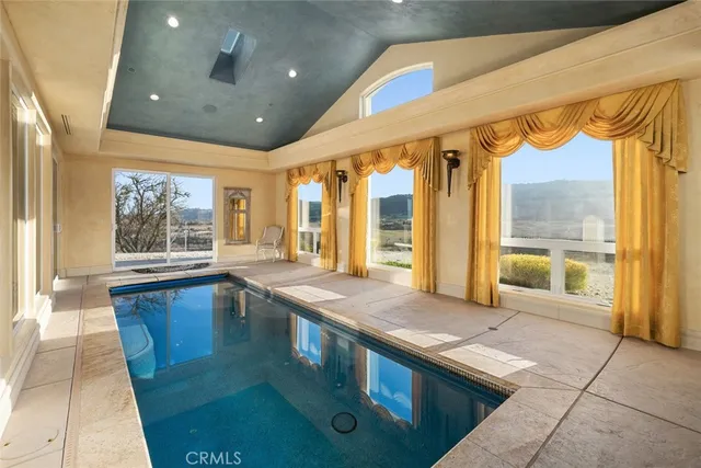 a view of a terrace with furniture and sitting area