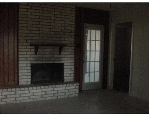 a living room with a fireplace