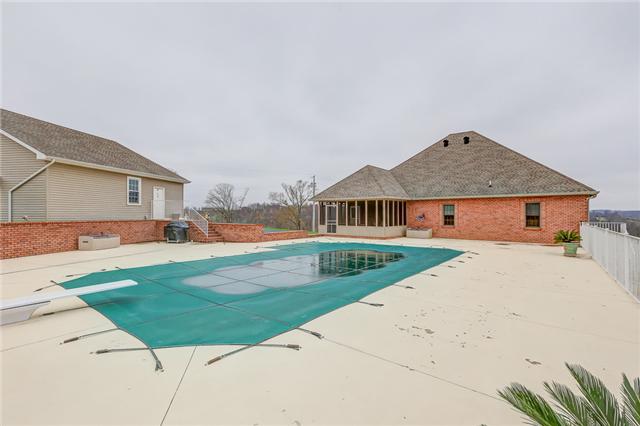 906 Swindle Road Lafayette, TN 37083 - Photo 16 of 21 The pool is perfect for cooling off on a hot summer's day!