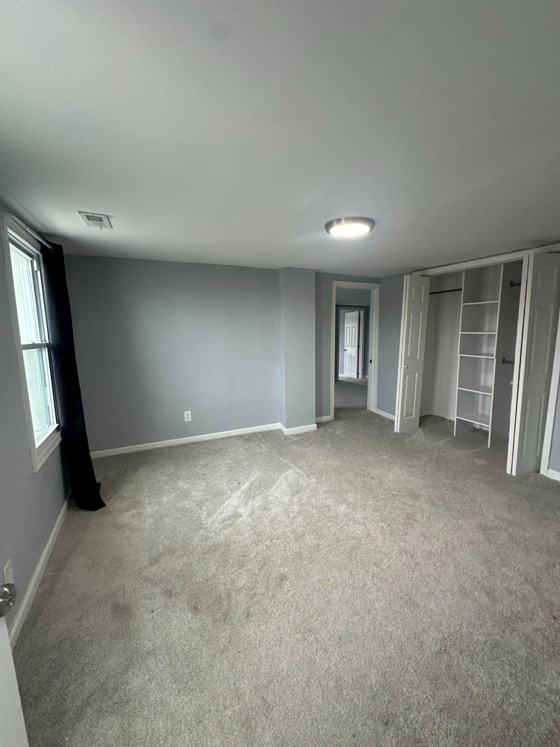 108 Bell Street Dover, DE 19901 - Photo 11 of 16 Spacious, light-filled primary bedroom retreat.