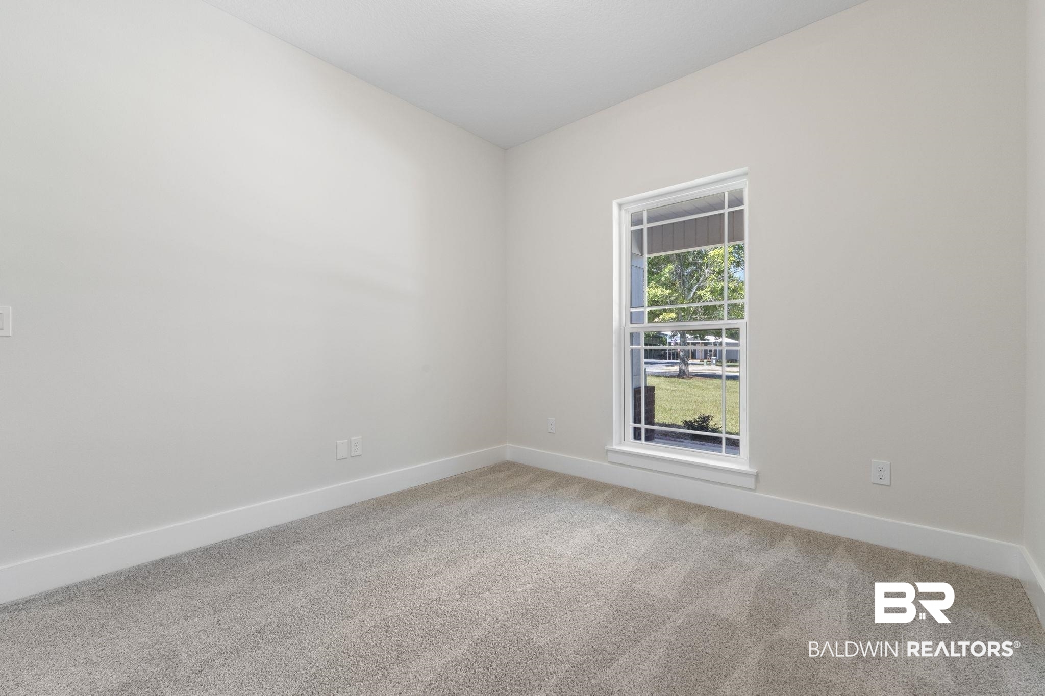 32563 Arbor Ridge Circle Lillian, AL 36549 - Photo 31 of 53 Empty room with baseboards and light colored carpet