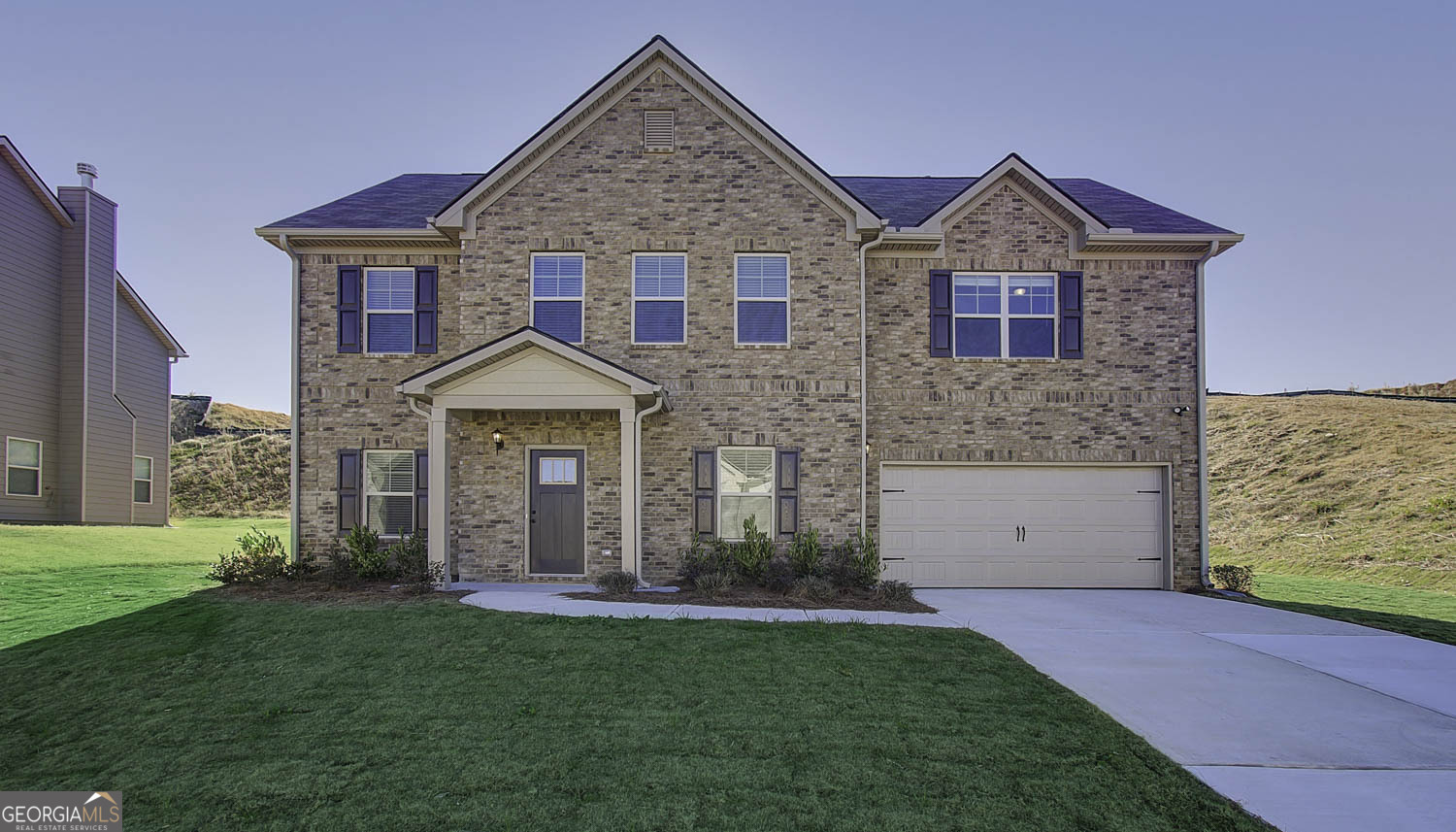 4908 Waxleaf Drive Atlanta, GA 30331 - Photo 1 of 1 a front view of a house with a garden and yard