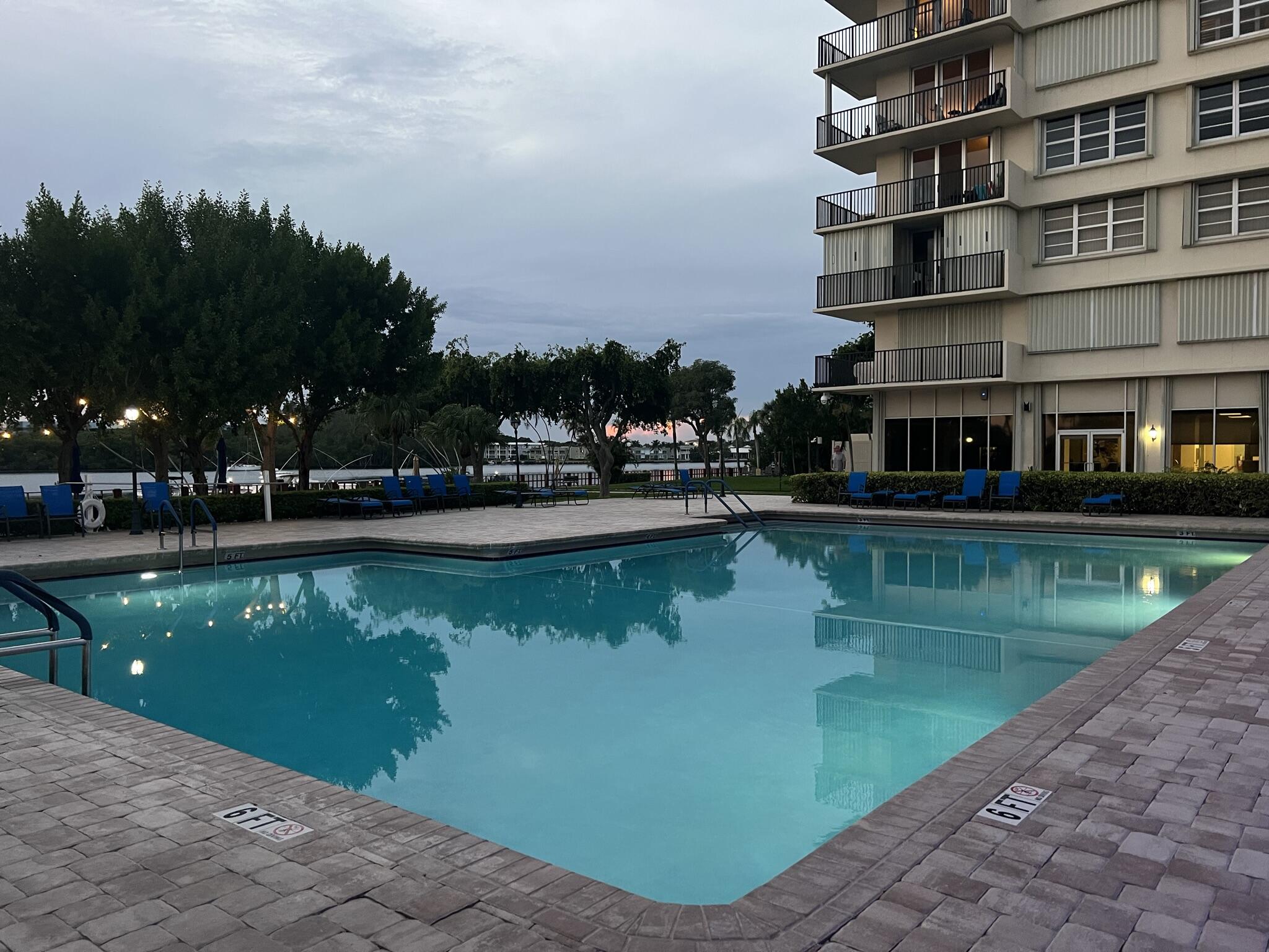2121 North Ocean Boulevard, Unit 608W Boca Raton, FL 33431 - Photo 49 of 62 The Pool At Sunset