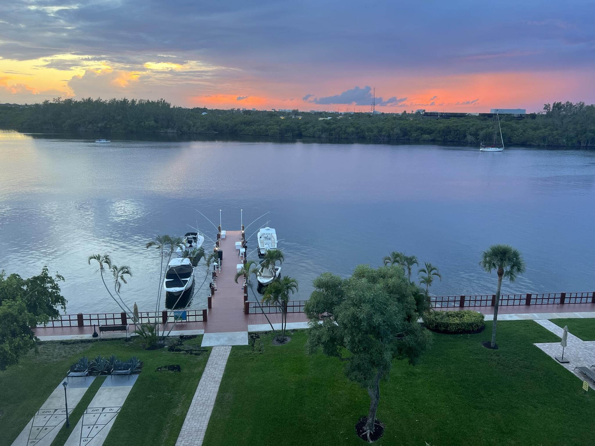 2121 North Ocean Boulevard, Unit 608W Boca Raton, FL 33431 - Photo 56 of 62 Dock at Sunset