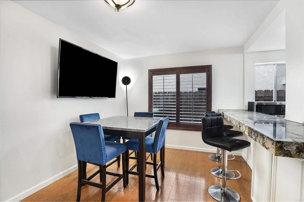 1826 Avenida Sevilla Oceanside, CA 92056 - Photo 18 of 34 a work room with furniture and a flat screen tv