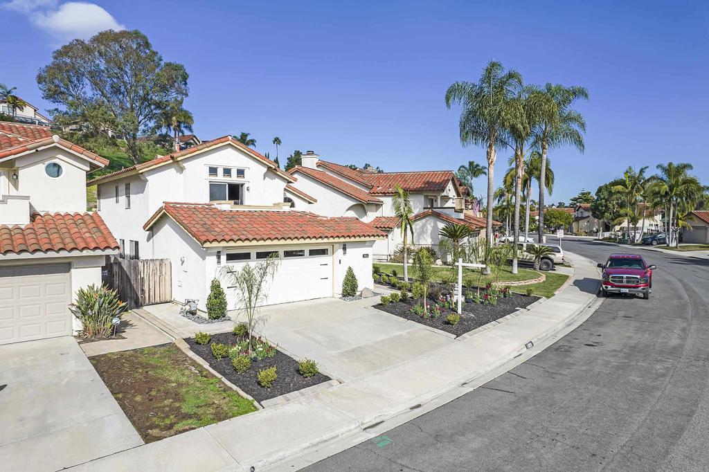 1826 Avenida Sevilla Oceanside, CA 92056 - Photo 4 of 34 front view of a house with a yard