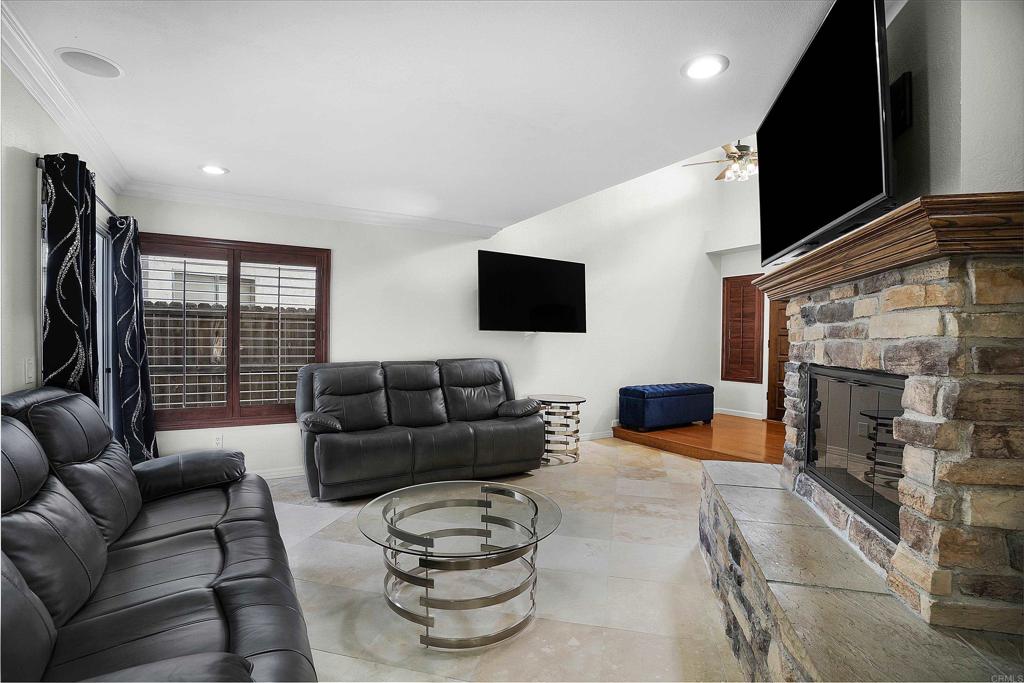 1826 Avenida Sevilla Oceanside, CA 92056 - Photo 8 of 34 a living room with furniture and a flat screen tv