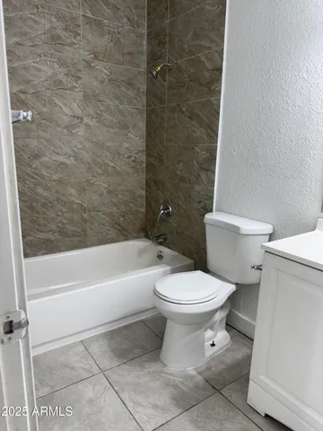 a kitchen with a sink stainless steel appliances and cabinets