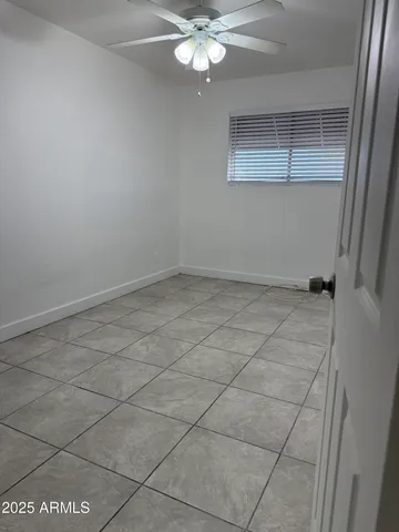 a kitchen with stainless steel appliances a stove a microwave and a counter top