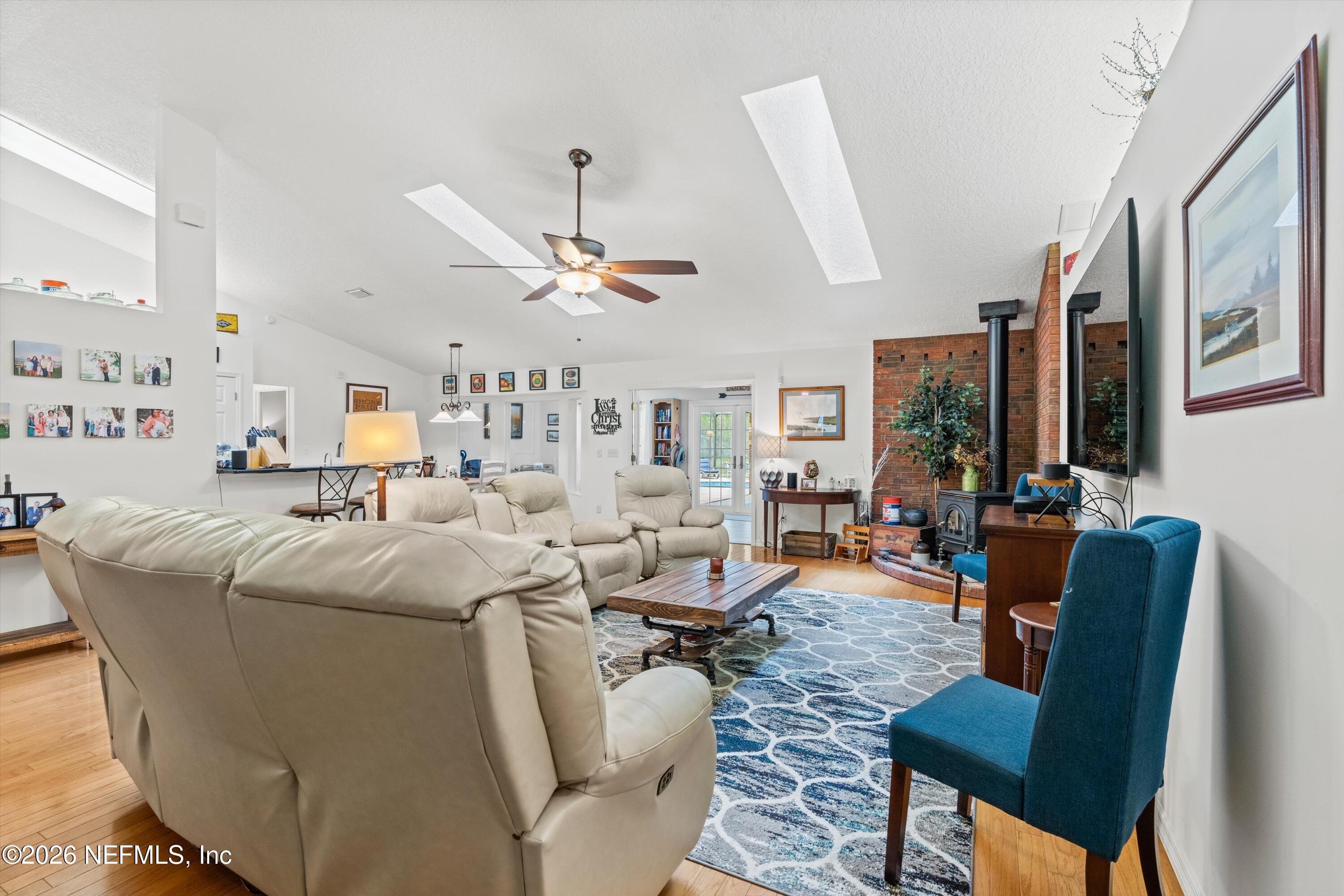 5566 Don Manuel Road Elkton, FL 32033 - Photo 10 of 47 a living room with furniture and a large window