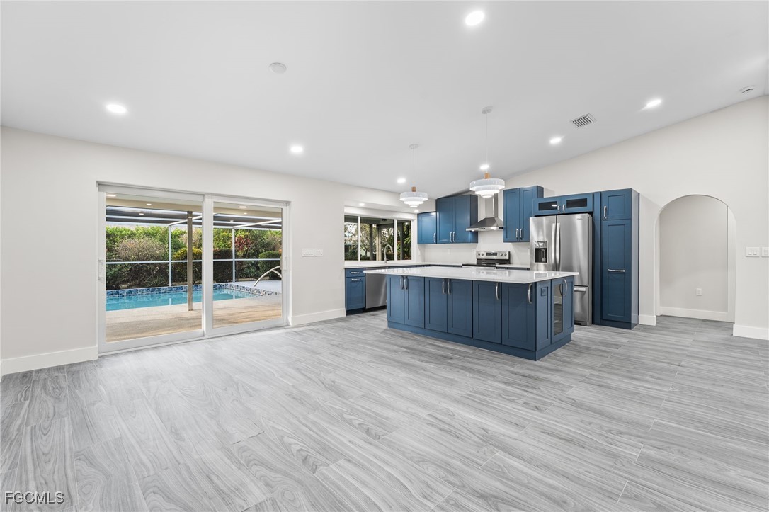12860 Iona Road Fort Myers, FL 33908 - Photo 18 of 44 a view of kitchen with wooden floor