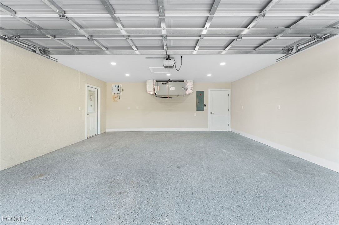 12860 Iona Road Fort Myers, FL 33908 - Photo 38 of 44 a view of empty room with wooden ceiling