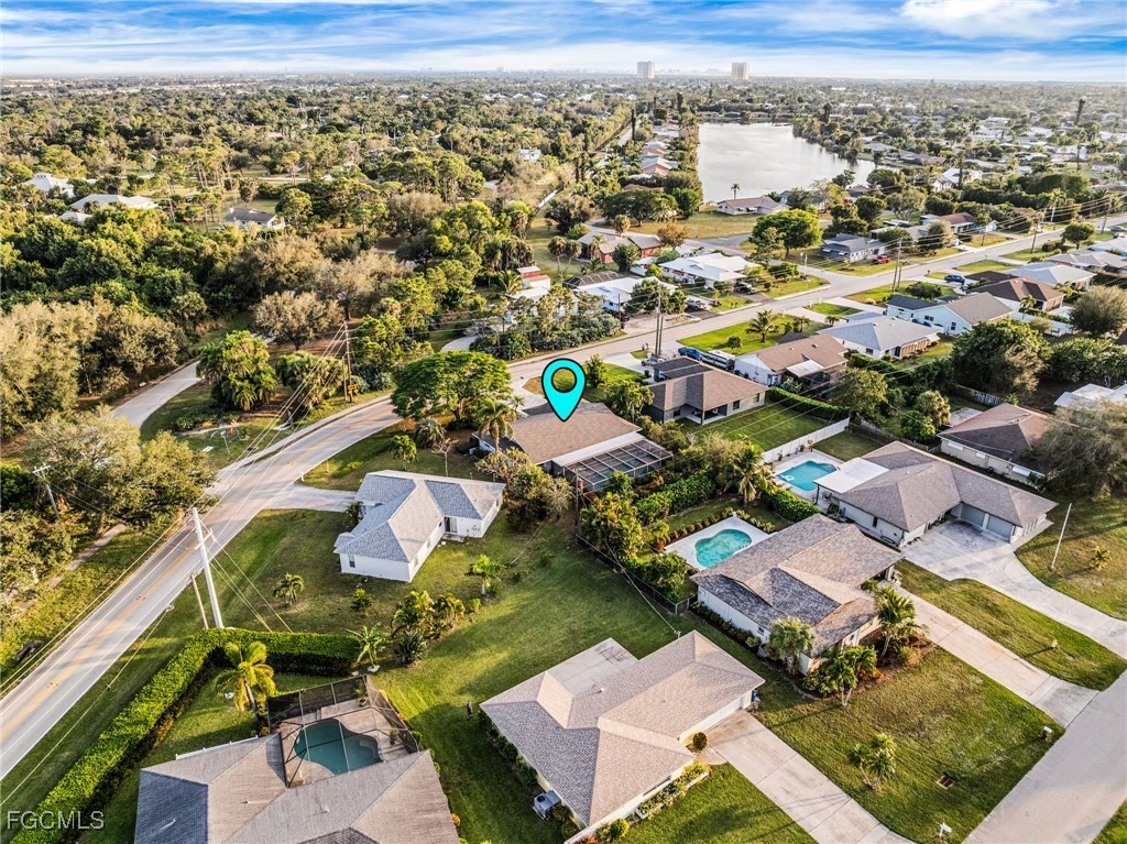 12860 Iona Road Fort Myers, FL 33908 - Photo 42 of 44 an aerial view of residential houses with outdoor space