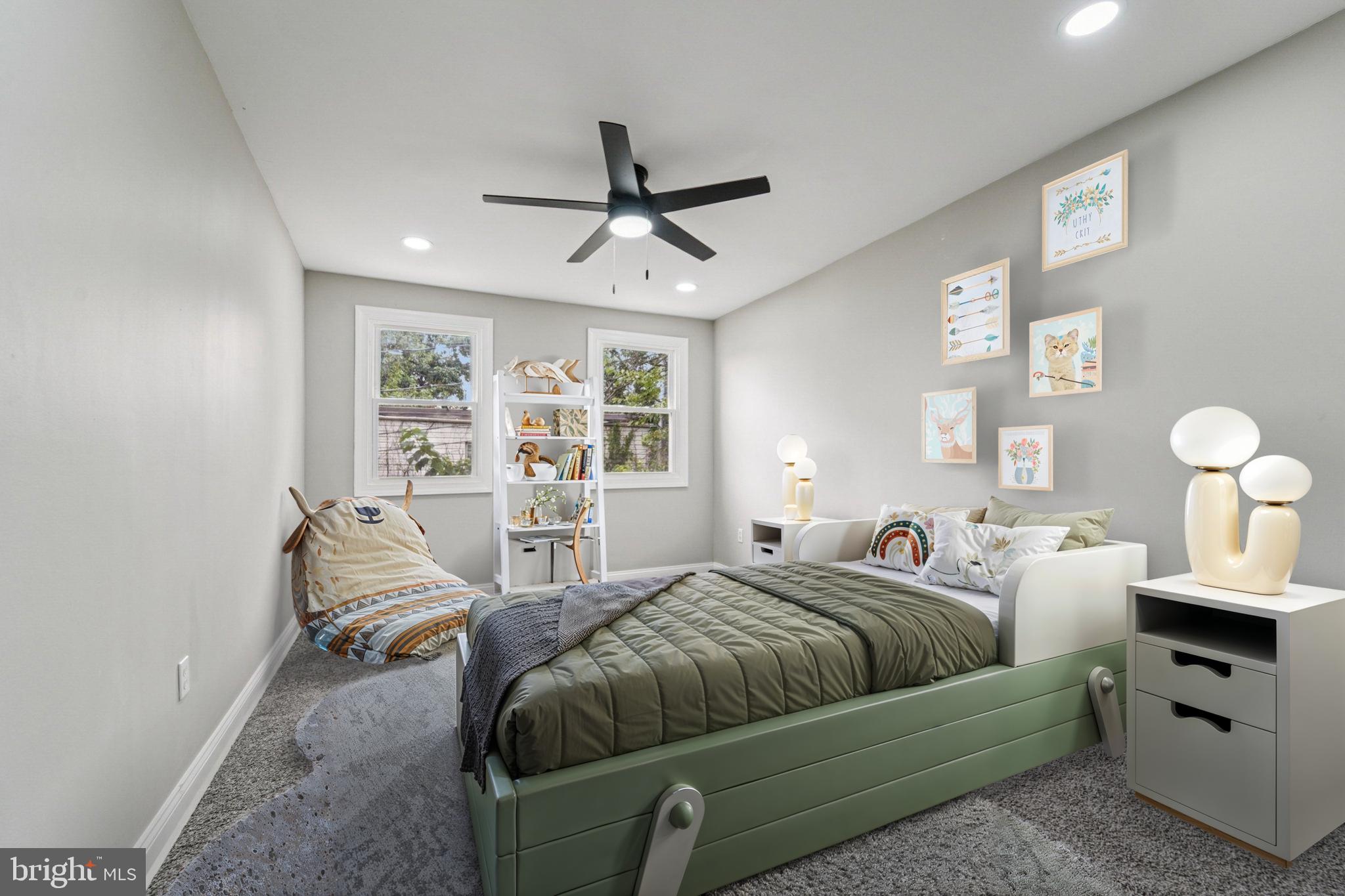 1525 West Pratt Street Baltimore, MD 21223 - Photo 11 of 31 a bedroom with furniture and a window