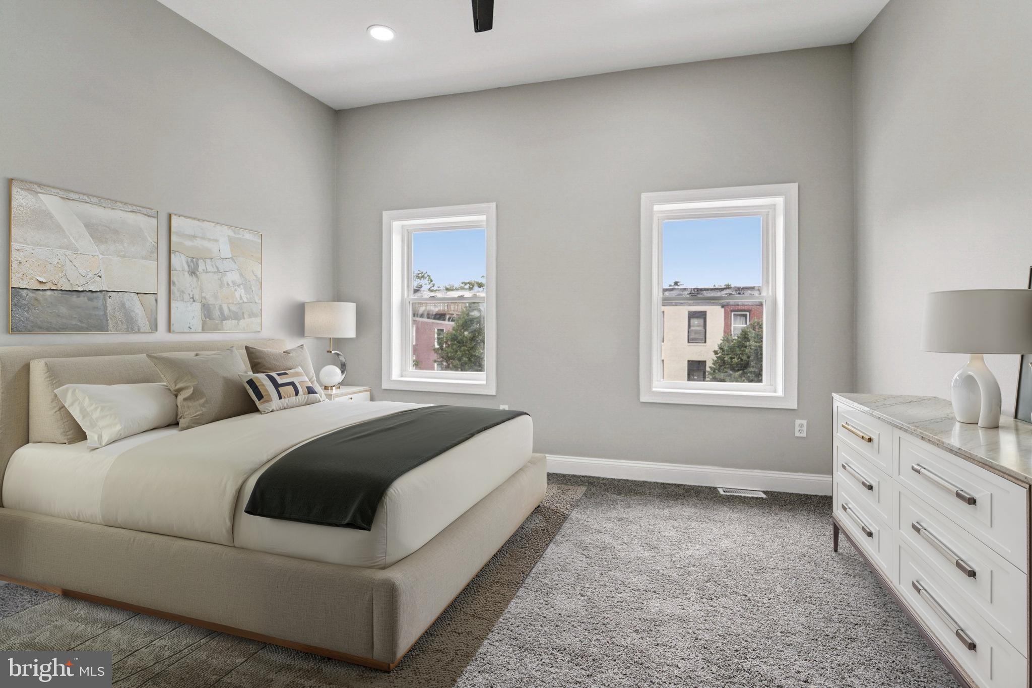 1525 West Pratt Street Baltimore, MD 21223 - Photo 18 of 31 a living room with a bed and a window