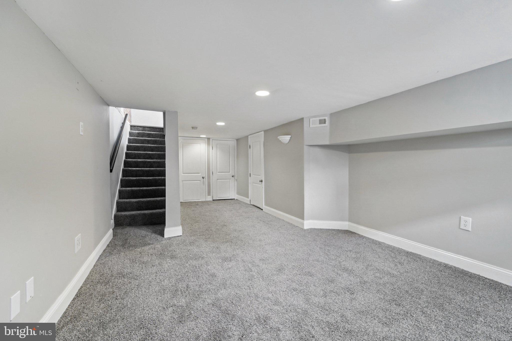 1525 West Pratt Street Baltimore, MD 21223 - Photo 23 of 31 a view of an empty room with a kitchen