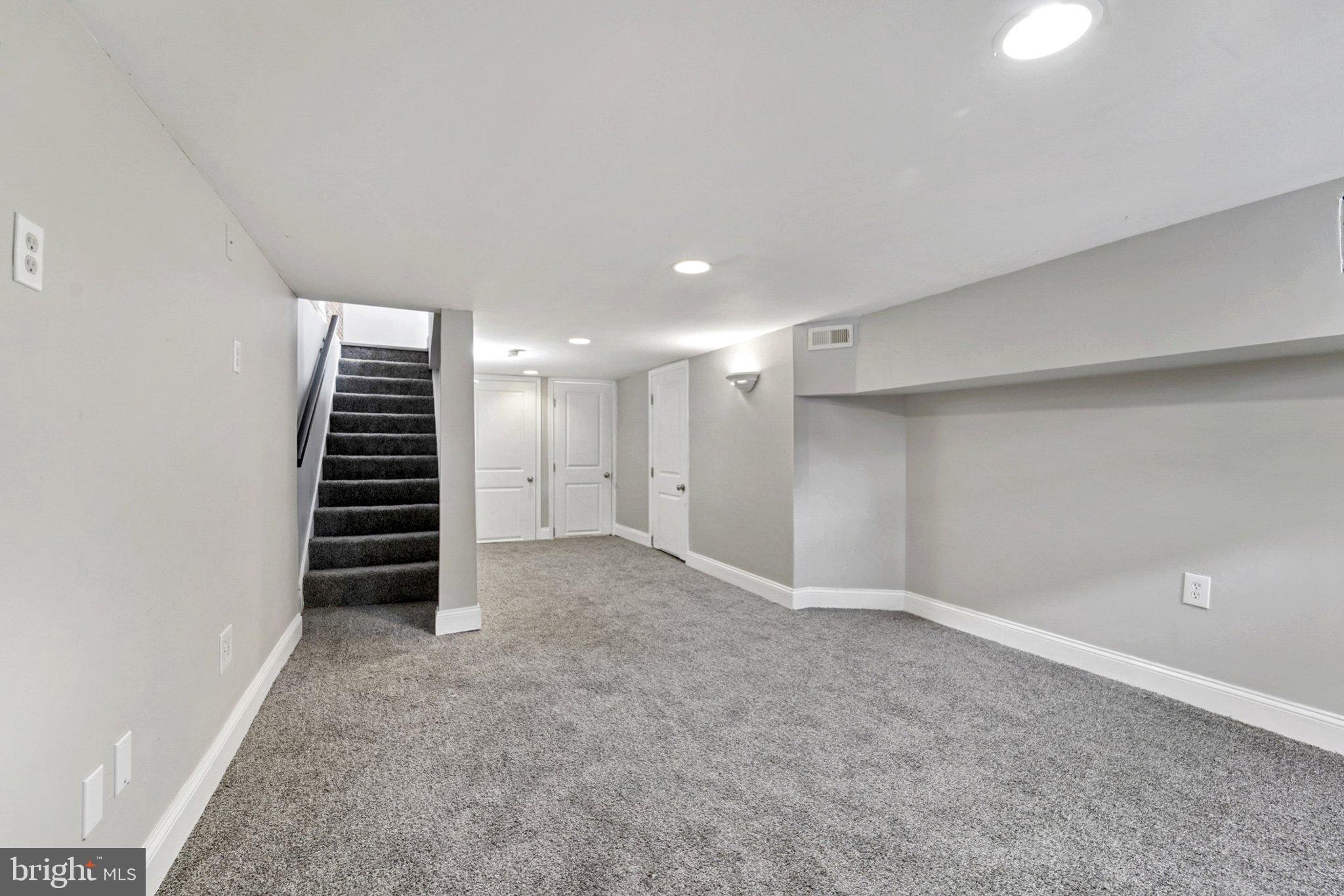 1525 West Pratt Street Baltimore, MD 21223 - Photo 25 of 31 a view of an empty room with a stairs