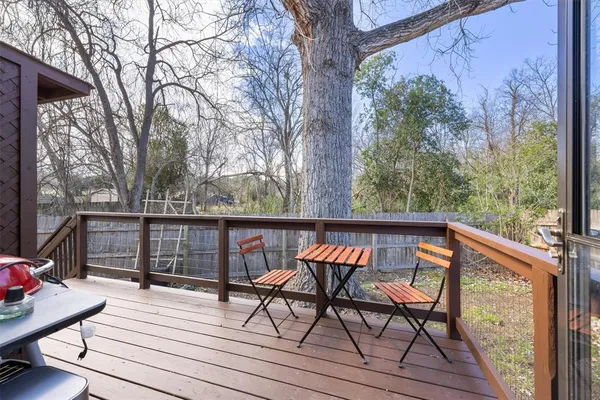 a view of a two chairs on the roof deck