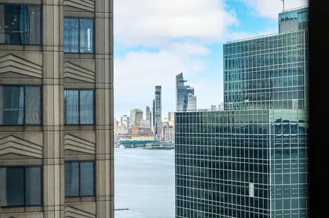 a view of a city with tall buildings