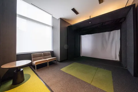 a living room with a chair and furniture