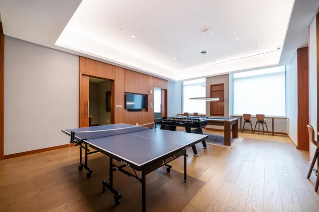 a view of a living room and dining room