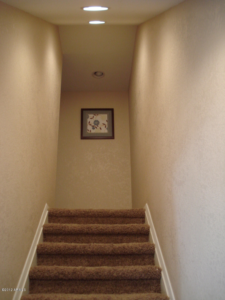 6157 North Granite Reef Road Scottsdale, AZ 85250 - Photo 13 of 29 Walking up stairs to remodeled 2nd level