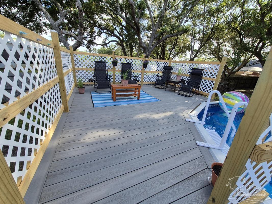 1960 Amhurst Court Navarre, FL 32566 - Photo 16 of 47 a view of outdoor space with seating