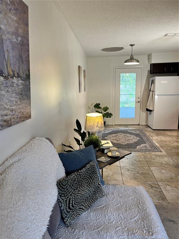 740 East Pearl Street, Unit C Bartow, FL 33830 - Photo 11 of 20 a bedroom with furniture and a window