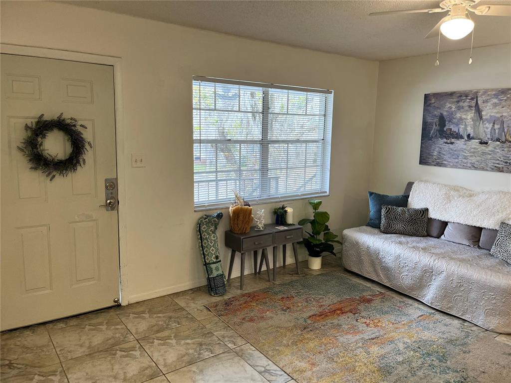 740 East Pearl Street, Unit C Bartow, FL 33830 - Photo 5 of 20 a living room with furniture and a window