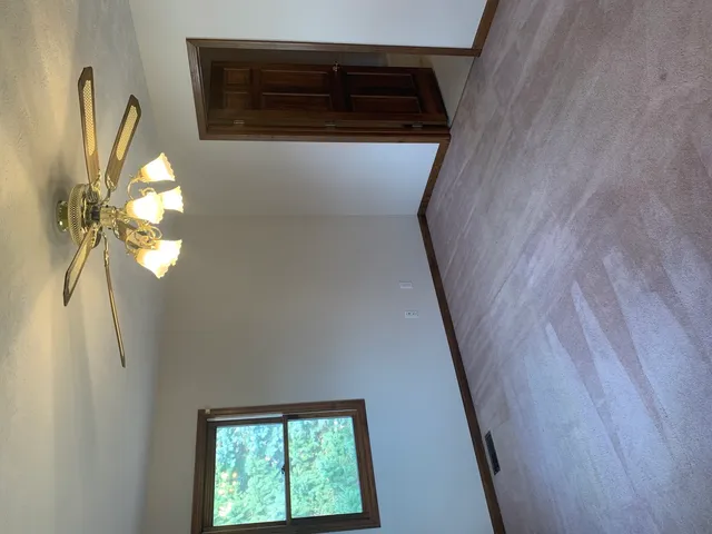 a view of a livingroom with a window