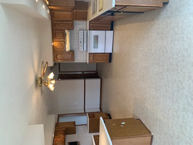 a view of a room with a small car parked on the wall