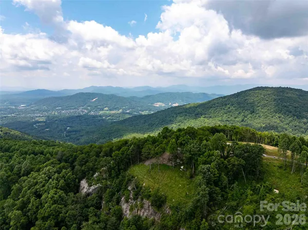 a view of mountain view with mountains in the background