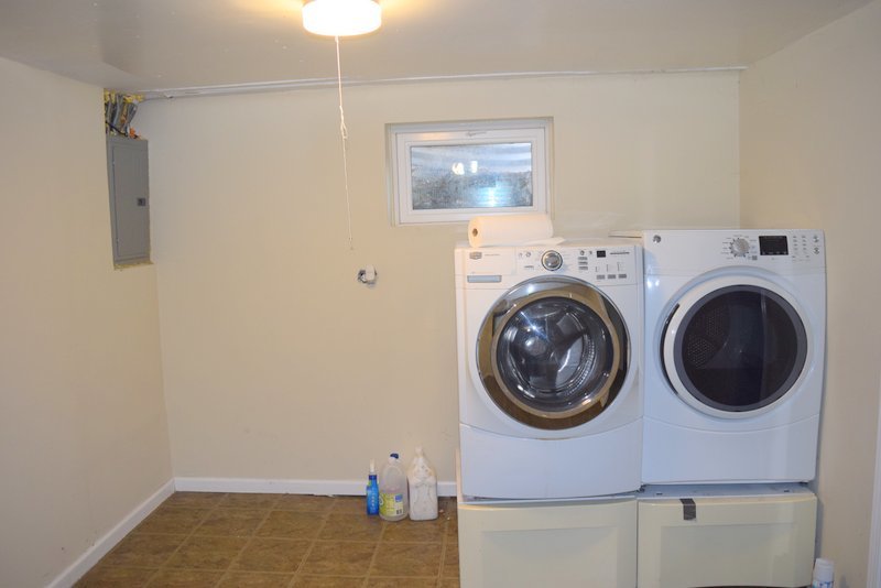1652 Greenwood Road Glenview, IL 60026 - Photo 14 of 15 a view of a hallway with washer and dryer