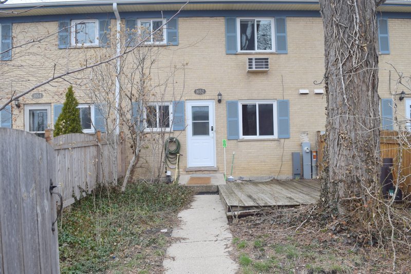 1652 Greenwood Road Glenview, IL 60026 - Photo 15 of 15 a front view of a house with a garden