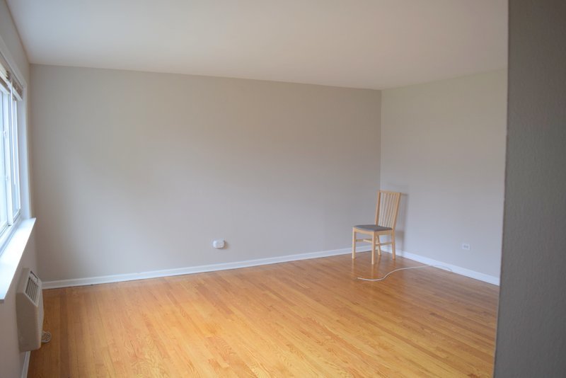 1652 Greenwood Road Glenview, IL 60026 - Photo 2 of 15 a view of an empty room and wooden floor