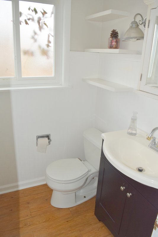 1652 Greenwood Road Glenview, IL 60026 - Photo 5 of 15 a bathroom with a sink and a toilet
