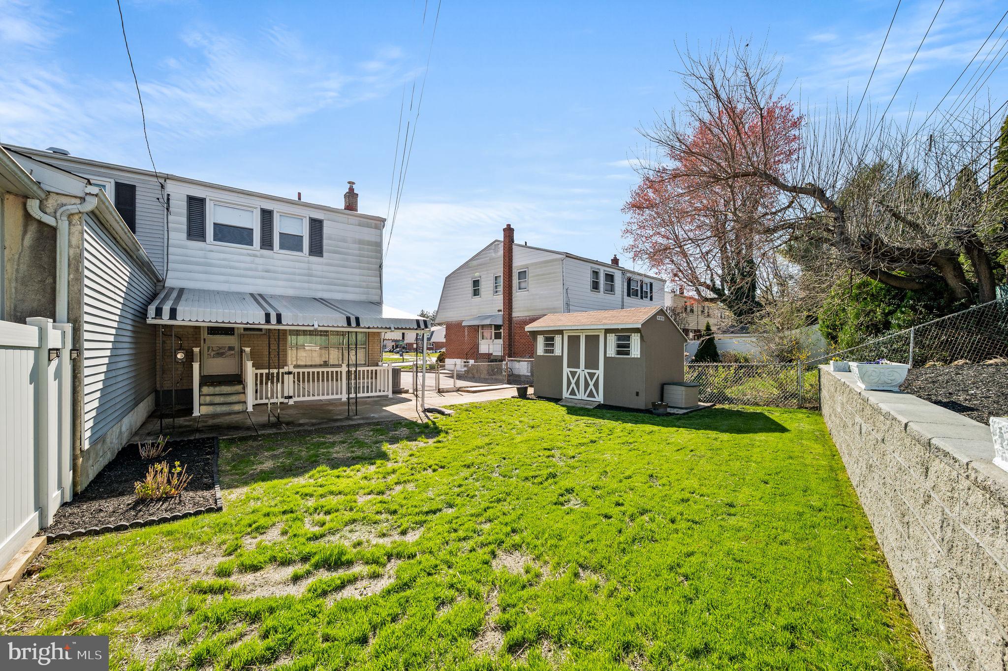 1565 Parklane Road Swarthmore, PA 19081 - Photo 27 of 28 a view of a house with a yard and pathway