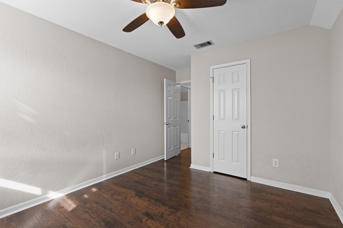 154 Meadowlark Circle Georgetown, TX 78626 - Photo 18 of 29 a view of an empty room with wooden floor