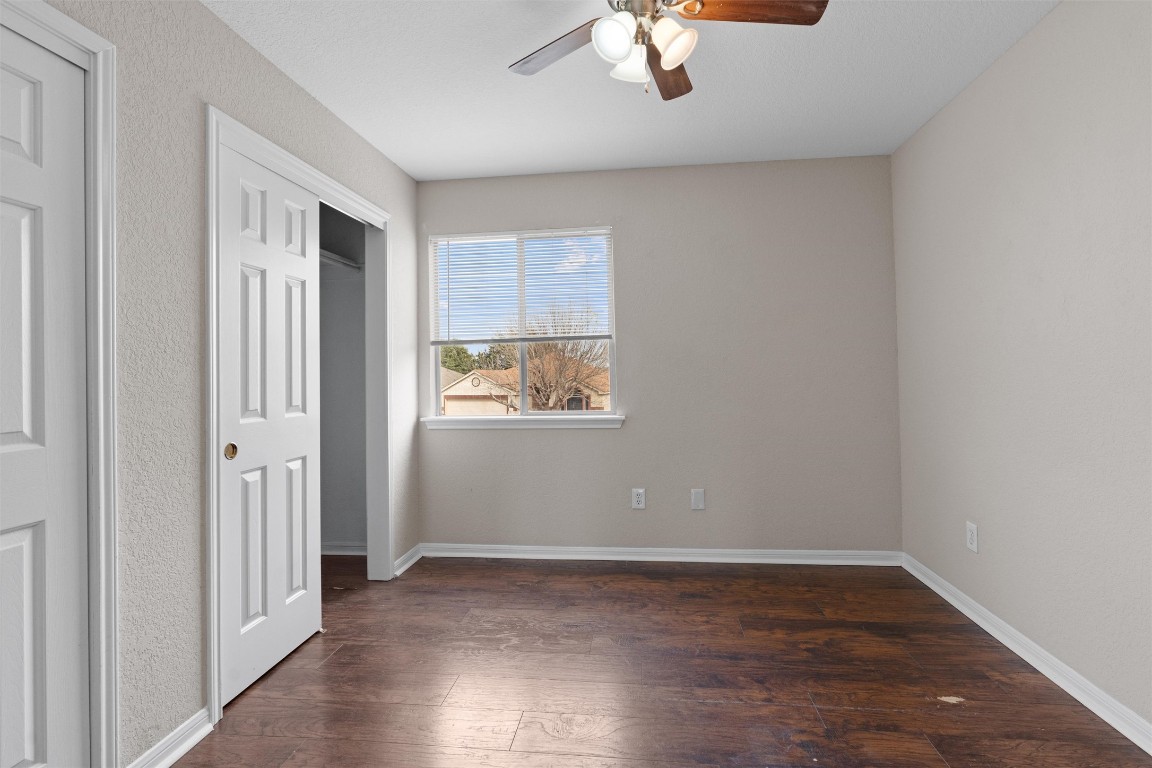 154 Meadowlark Circle Georgetown, TX 78626 - Photo 21 of 29 wooden floor in an empty room with a window