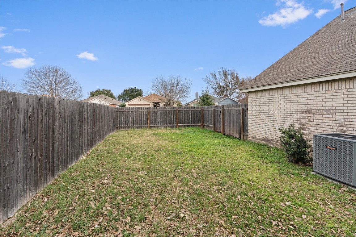 154 Meadowlark Circle Georgetown, TX 78626 - Photo 26 of 29 a view of a backyard with a garden