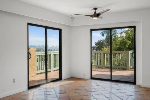 a view of a room with sliding glass door and a porch