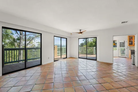 a view of a room with windows