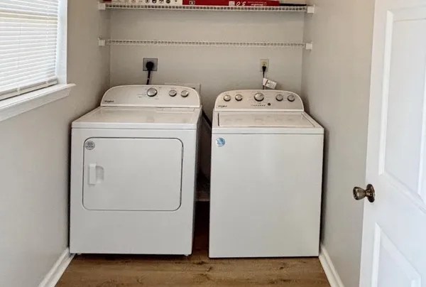a utility room with dryer and washer